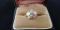 14kt, y/g Size 9 four stone Linde Star Ring with one (1) .05 ct. full cut diamond. Total weight 4.76