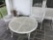 Round metal table, two chairs