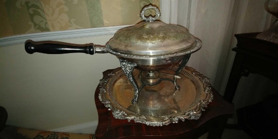 Large heavy silverplate serving dish with handle on tray with warmer