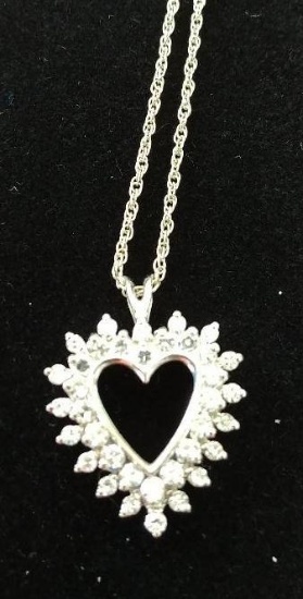 Ladies 14kt, w/g thirty-six diamond heart pendant