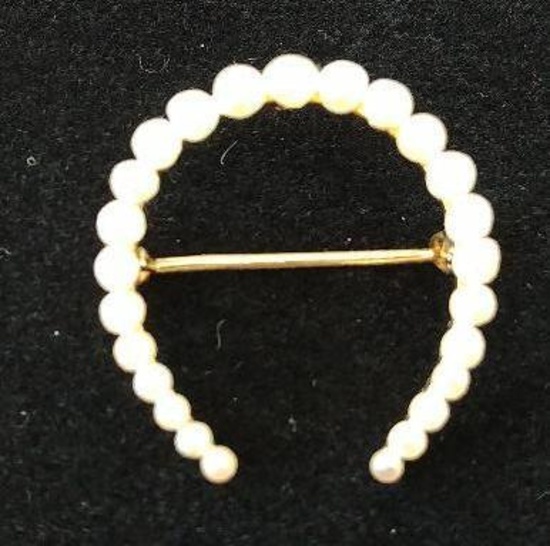 14 kt, y/g horseshoe pin with twenty-five (25) seed pearls ranging in size from 2mm to 3mm.