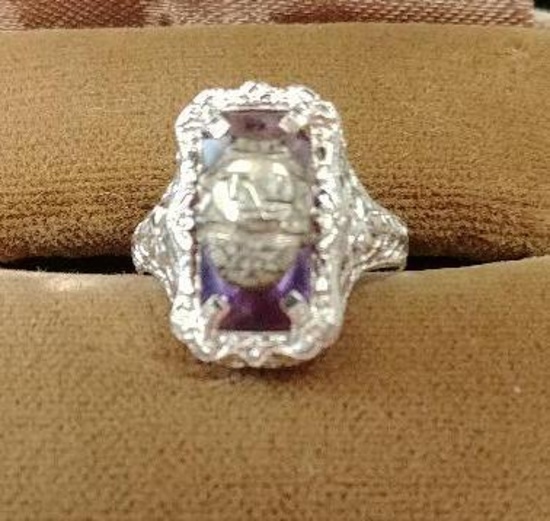 10 kt, w/g filigree ring with amethyst stone. (Sorority)