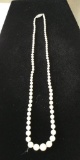 22?? Cultured Pearl Necklace with one hundred and three (103) 5 mm pearls with 14 kt, w/g clasp.