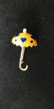 18 kt, y/g Umbrella Pin, enameled yellow with blue hearts. Has one (1) .04 ct. diamond.