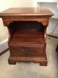 Mahogany finish in table with drawer