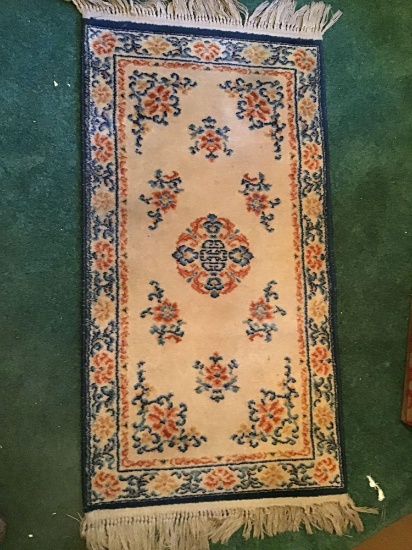 Wool rug. 55 x 26 inches.