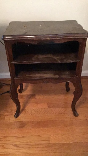 Small two shelf end table.  Shows wear