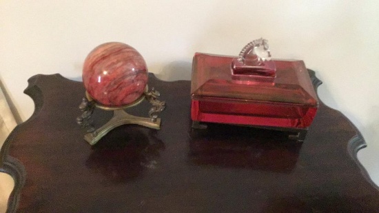Cranberry dresser box.   Marble sphere in brass