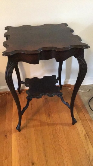 Mahogany end table.  Carved legs.  Jerks and Son.