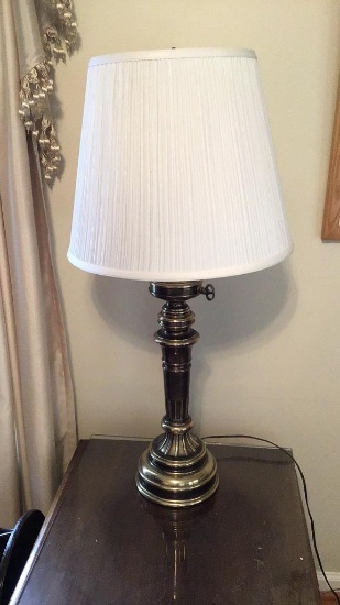 Brass lamp.  34 inches tall.  With shade