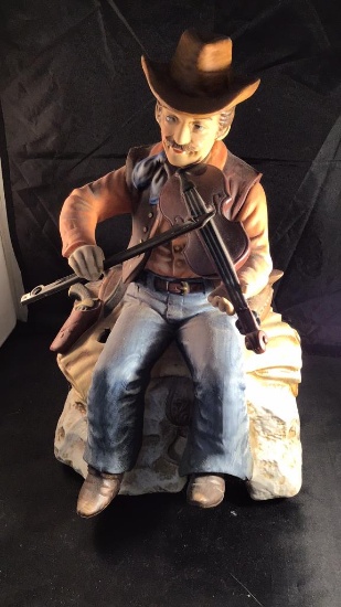 Cowboy fiddler musical figurine.   Animated.