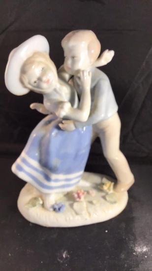 Lladro-style figurine.  8 inches.