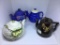 Four teapots.  Blue floral has damaged lid