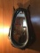 Oak and iron horse collar mirror. Measures 30