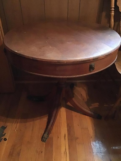 Mahogany drum top table, brass feet.  30 inch