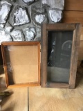 Two small display cases. 16 & 21 inches tall