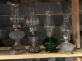 Four oil lamps