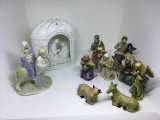 Three nativity sets.  Far left is Homco.