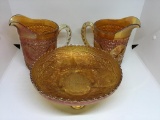 Marigold carnival glass. Footed bowl, two 6”