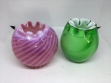 2 pinch top bowls.  Rose swirl and green encased.