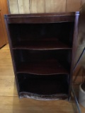 Bookcase 31 inches tall.  Needs refinished.