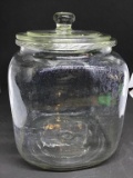 Nine inch unmarked store jar with lid