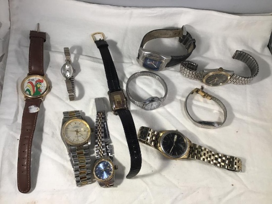 10 miscellaneous watches.  Two Rolex repro.