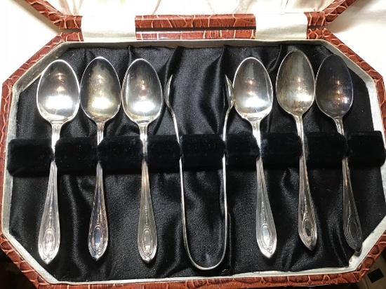Spoon set.  Six spoons plus tongs.  Hallmark on