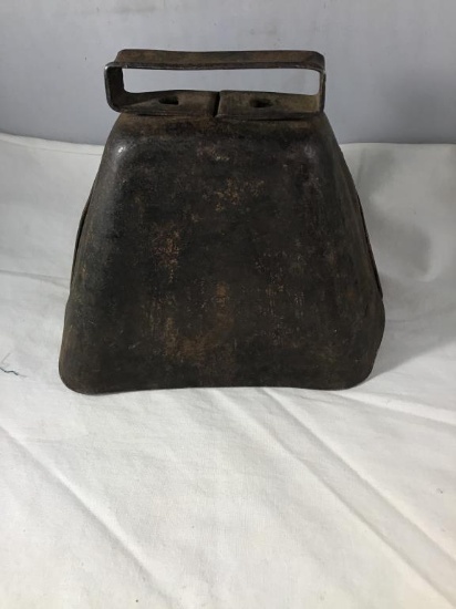 Old cowbell.  Four inches tall