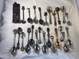 25 collector spoons.  Mostly state spoons.