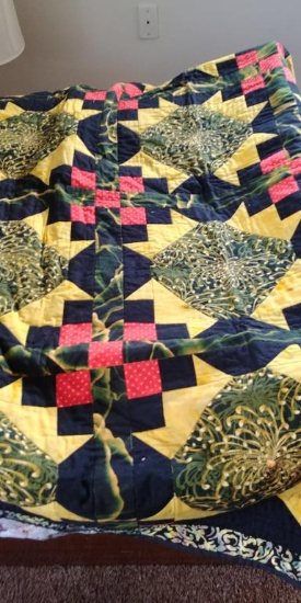 Handmade quilted throw.  48 x 48.