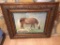 Antique oak frame with pony print.  31 x 26