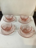 Four pink Depression cups and saucers with four