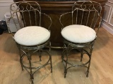 Pair of exceptional iron barstools with
