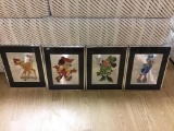 Four Disney framed metallic prints
