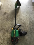 Weed eater.  Cordless.  With charger