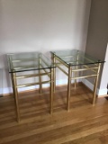 Pair of glass and brass end tables.
