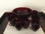 Ruby red punch bowl with 30 cups.
