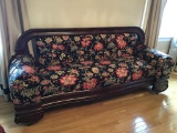 Upholstered sofa.  Mahogany wood trim.  Beautiful