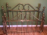 Full size contemporary brass bed.  No rails or