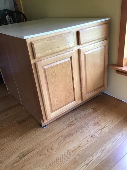 Double storage cabinet. Doors open on both ends.