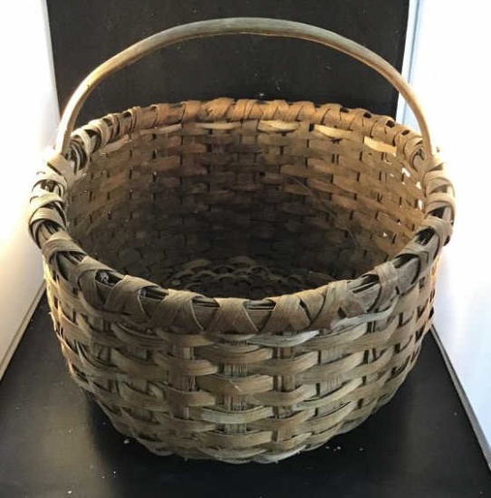 Handmade oak basket.  13 high 14 wide.  Repair on