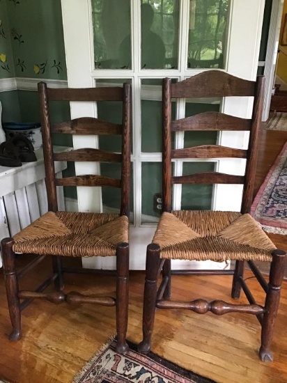 Pair of Ancient English oak ladderback chairs.  Rush seats.  39 tall x 18.5 inches