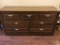 7 drawer oak finish chest.  56 inches.  Small