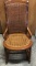 Antique rattan bottom rocker