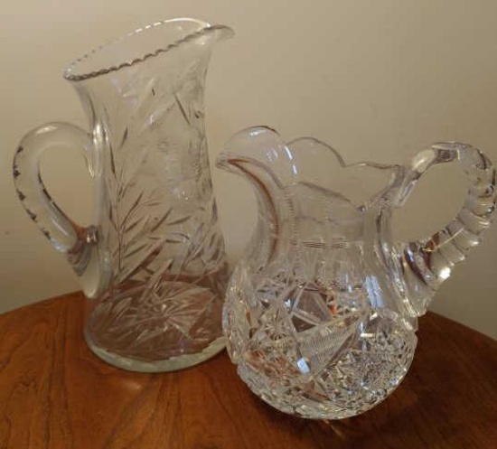 Pair pitchers.  Cut glass. 11 in and 8 in