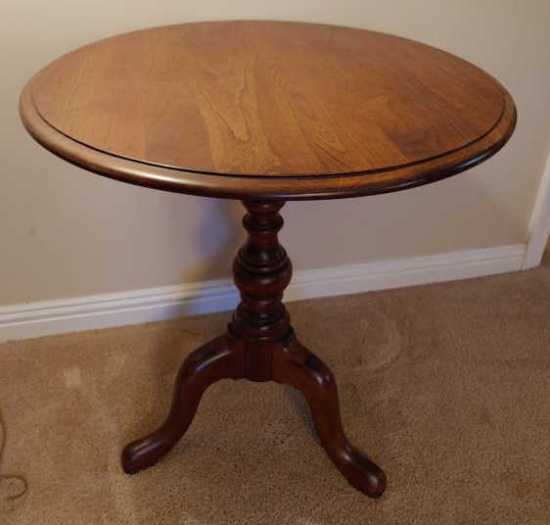 Mahogany pedestal table.  26 inches tall.