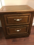 Two drawer night stand oak finish.  Matches lot