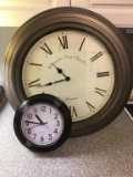 Pair wall clocks.  Battery.  20 and 9 inches