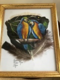 Two paintings.  Painted on feathers.  Framed